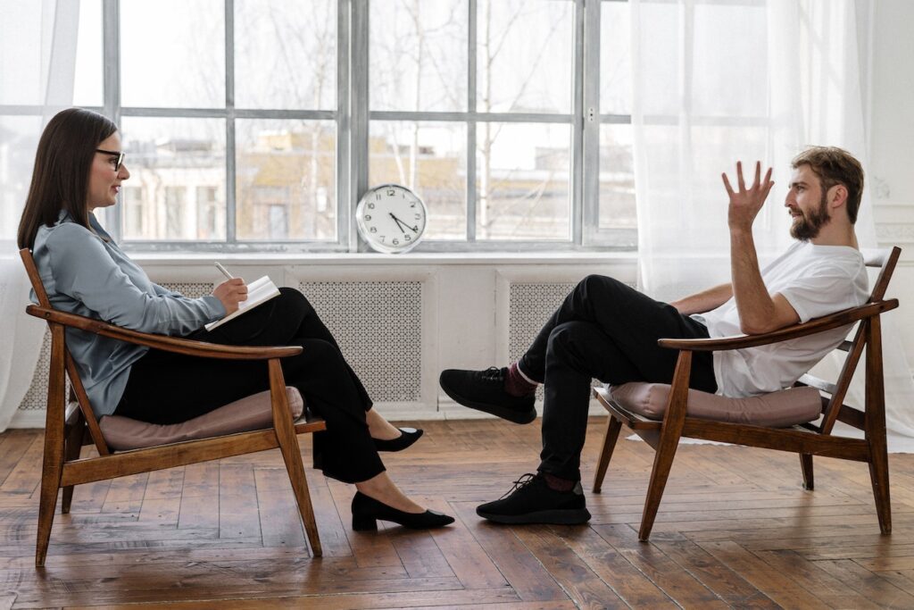 ADHD coach and person seeking adhd support in consultation.