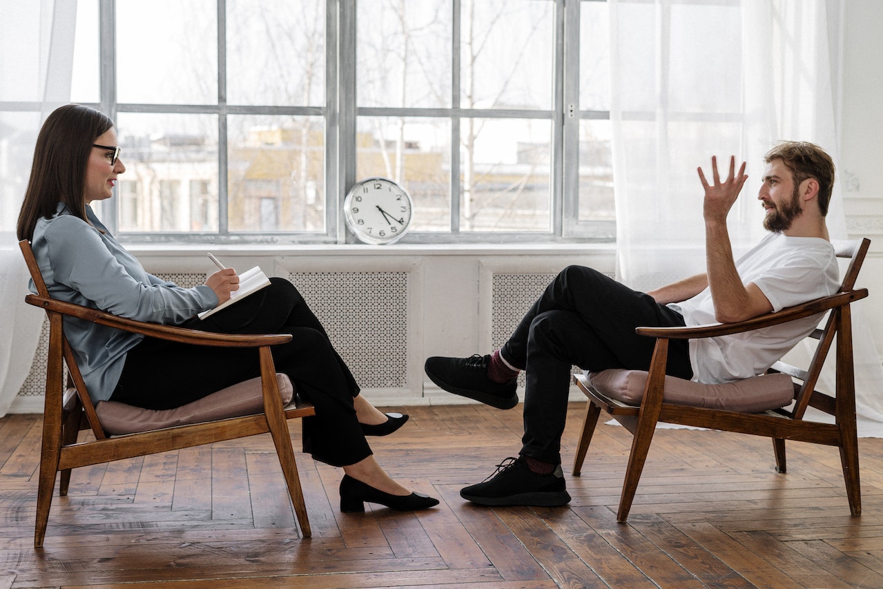 ADHD coach and person seeking adhd support in consultation.