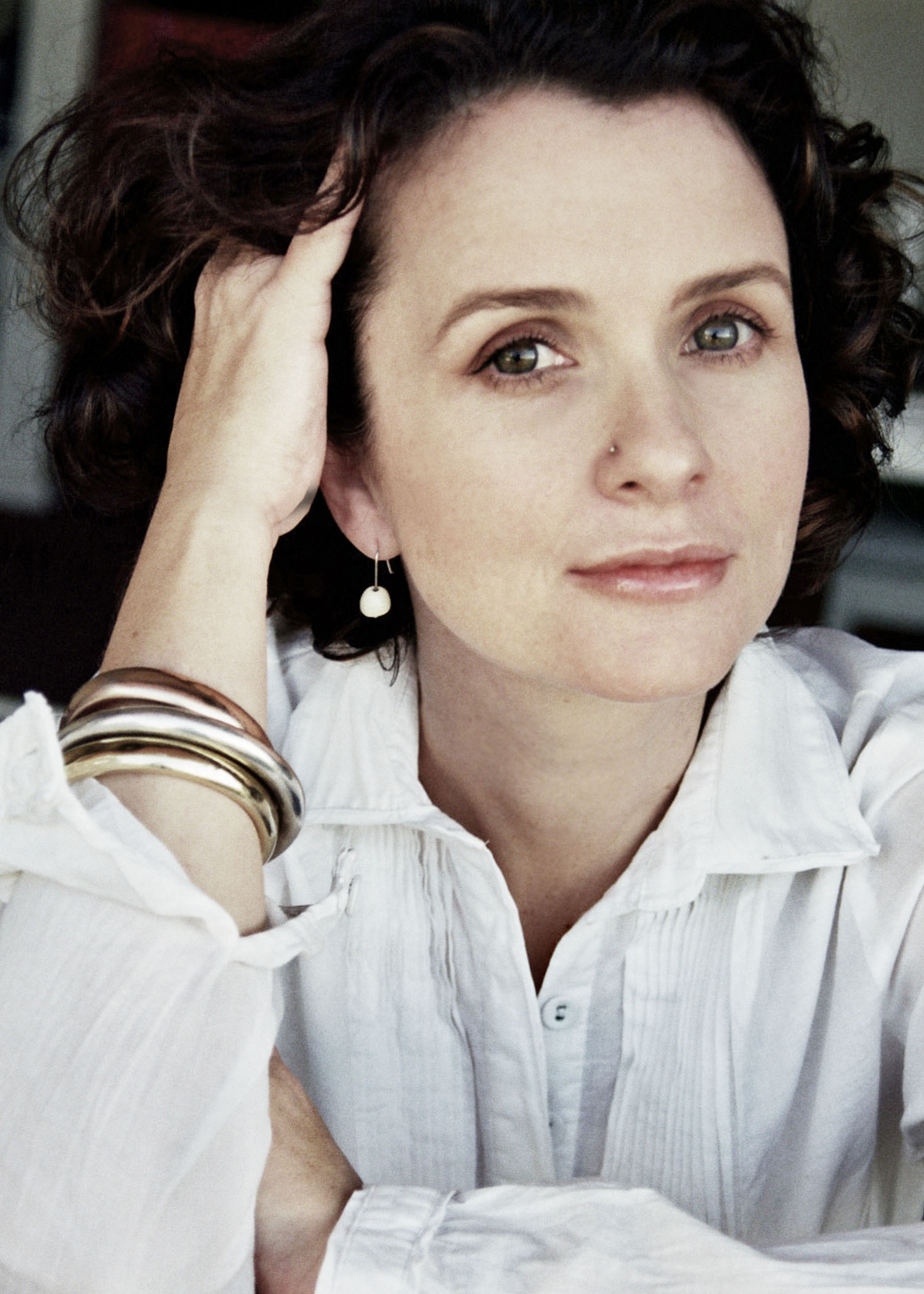 headshot of amelia haines standing with confidence, smiling at the camera